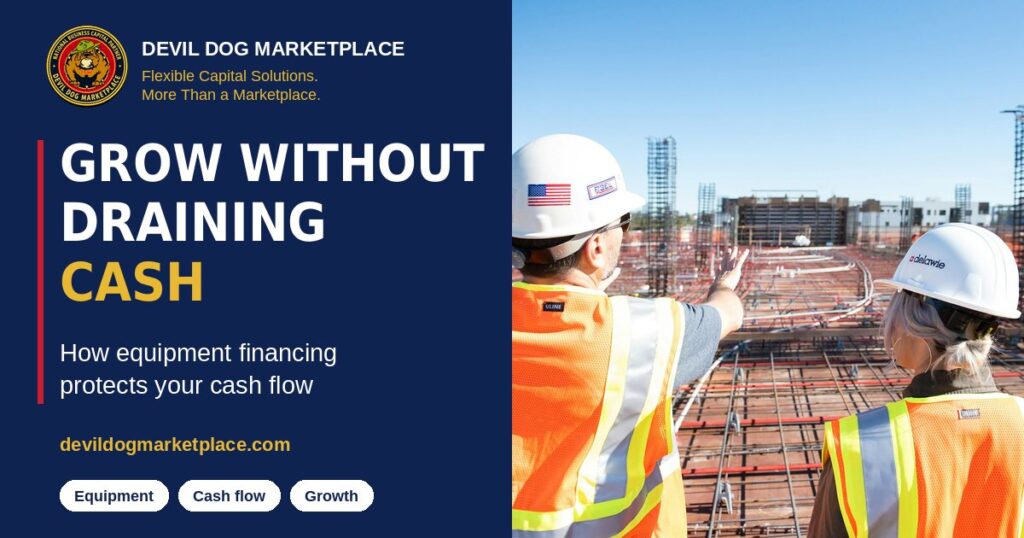 Two construction workers in hard hats and safety vests looking over a job site, for an article on equipment financing and cash flow